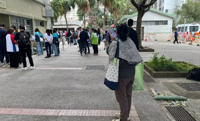 這為女士來去匆匆，對金額感無奈。巴士的報記者攝