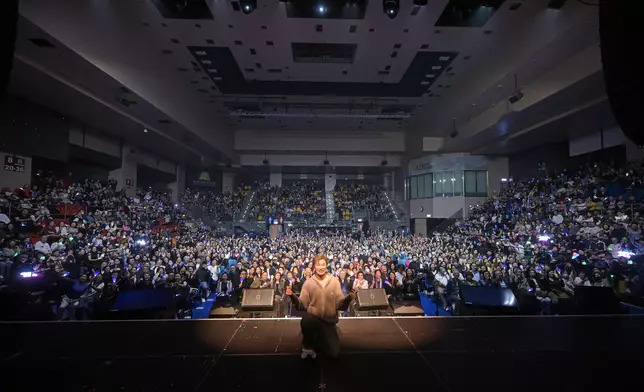 阿譚花37年努力終如願以償。