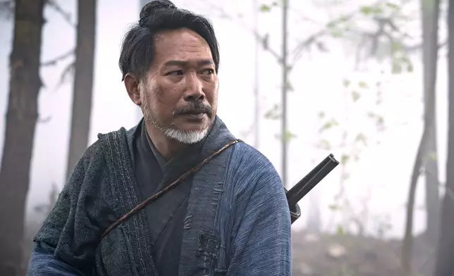 黃文標（飾 滕翼）