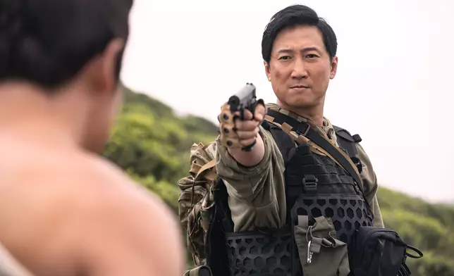 洪天明（飾 Phil）