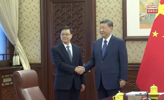 李家超赴京向習近平述職。香港電台直播截圖