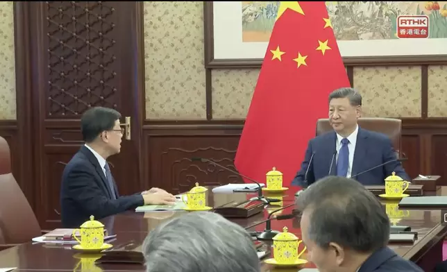 李家超赴京向習近平述職。香港電台直播截圖