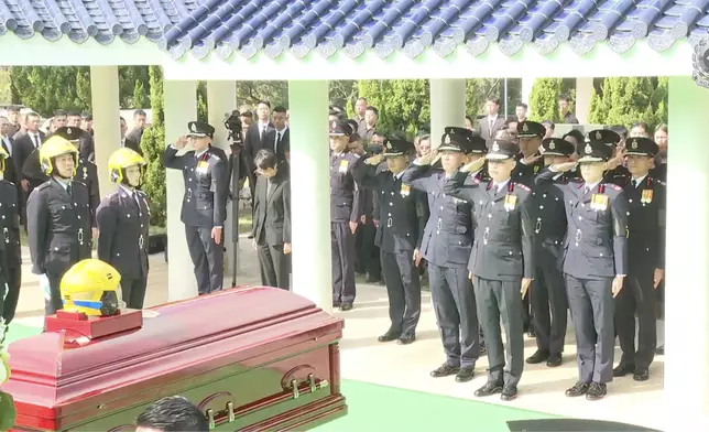 何偉豪長埋浩園。消防處直播截圖