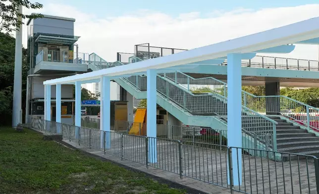 連接現有和新建巴士轉乘站的行人通道上蓋。路政署模擬圖片