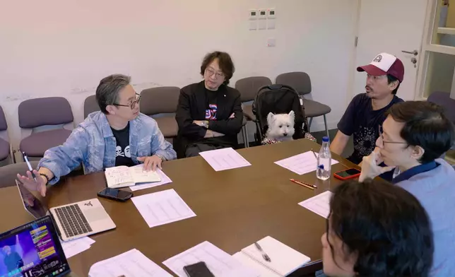 Eric Kwok真係夠晒全情投入。 圖34就係佢隻愛犬。