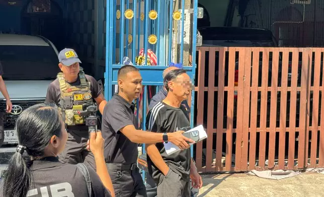 梅耀強被帶走。泰國警方圖片