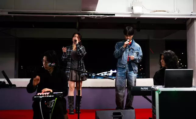 周智敏、何晉樂