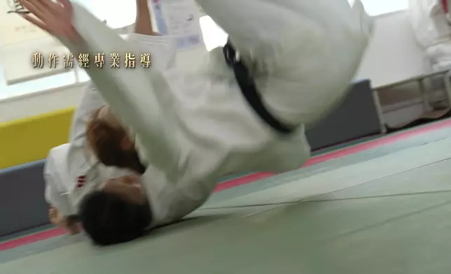 馬浩宜與母親練習柔道亦全力以赴。