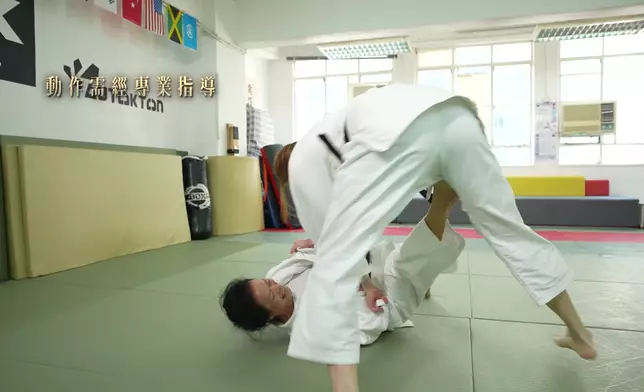馬浩宜與母親練習柔道亦全力以赴。