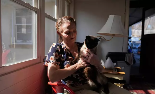 47歲的謝茜嘉湯普森（Jessica Thompson）於2026年3月21日，周六，在伊利諾伊州羅克福德的家中拍攝肖像照。(美聯社圖片/Erin Hooley) AP圖片