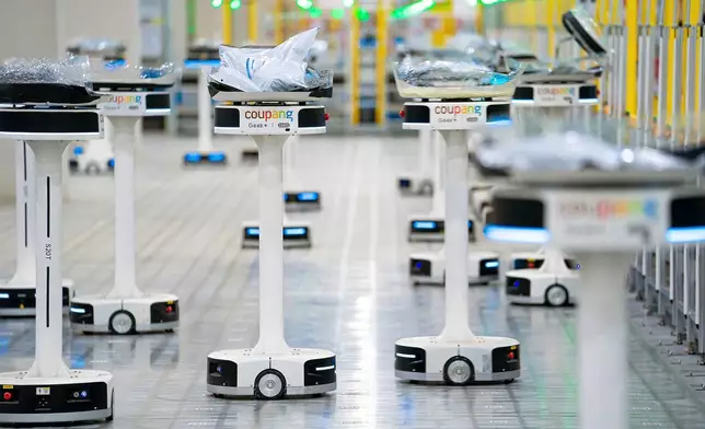 Coupang已投入數十億美元，建立其端到端物流基礎設施，當中整合了人工智能及定制機械人等尖端技術。 AP圖片