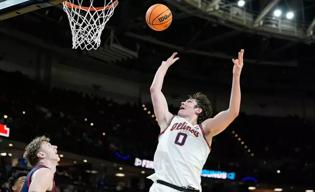 伊利諾大學前鋒大衛米爾科維奇（David Mirkovic）（0號）在2026年3月19日周四於南卡羅來納州格林維爾舉行的NCAA大學籃球錦標賽首圈上半場，對陣賓夕凡尼亞大學時投籃。 (美聯社圖片/布林安德森 Brynn Anderson) AP圖片