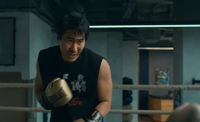 Andrew（吳育剛飾）