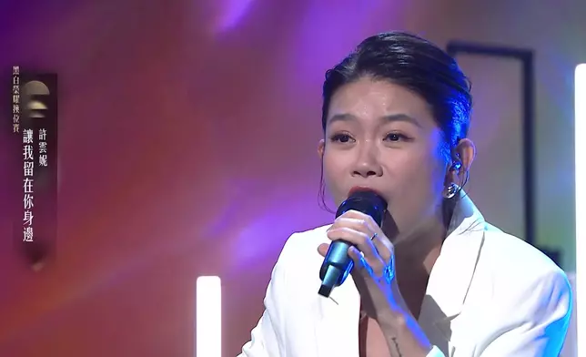 雲妮選唱《讓我留在你身邊》。