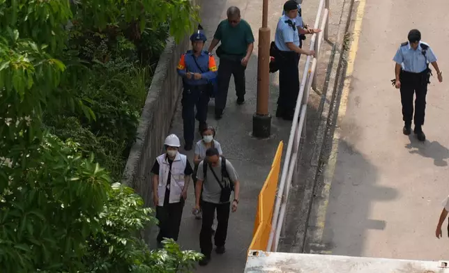 林政財認為，由可信任的親友或社工陪同上樓。巴士的報記者攝