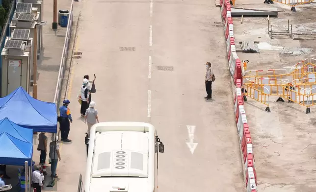 有居民在現場影相留念。巴士的報記者攝