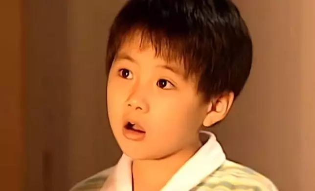 丁力小時候表情多多