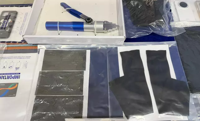 警拘2人，涉爆竊案。