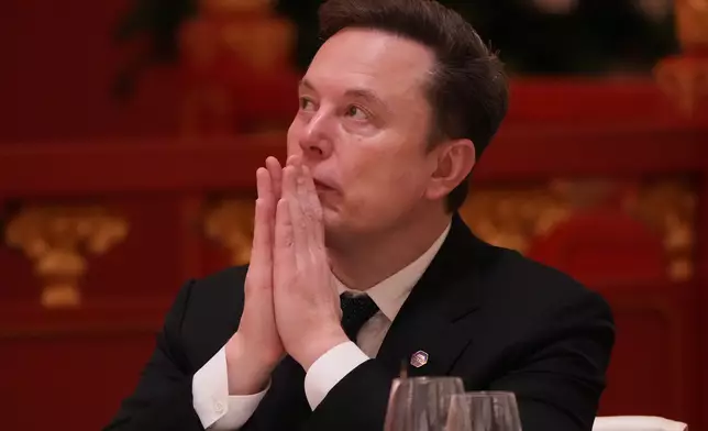 美國總統特朗普訪華期間，隨行的Tesla行政總裁Elon Musk（馬斯克）亦成為焦點。AP圖片