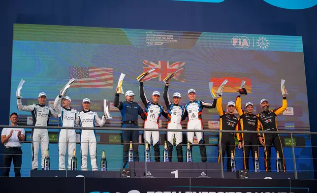 WEC 比利時站各組別獲獎車手於領獎台上合影