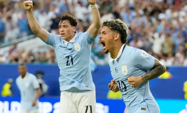 2026年6月15日周一，烏拉圭球員馬克西·阿勞霍在佛羅里達州邁阿密花園舉行的世界盃H組沙特阿拉伯對烏拉圭足球賽中，慶祝為球隊射入首個入球。(美聯社圖片/Lynne Sladky) AP圖片