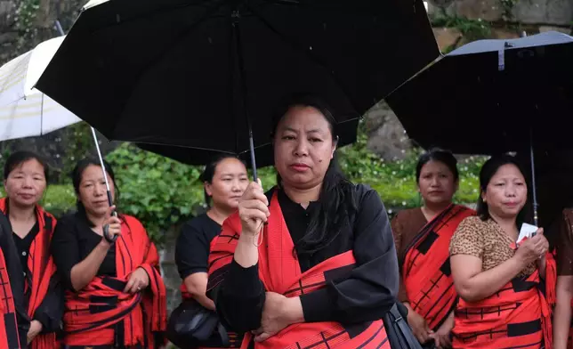 45歲的桑格利什·伊姆基翁周五（2026年6月19日）在印度東北部那加蘭邦首府科希馬，參與一場抗議針對女性性暴力案件增加，並要求為受害人伸張正義的示威活動。(美聯社圖片/Yirmiyan Arthur) AP圖片