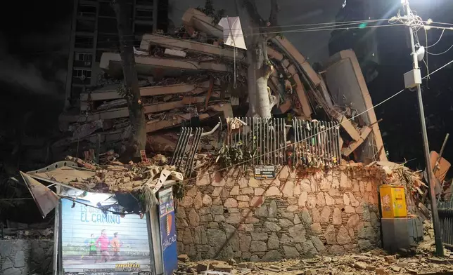 委內瑞拉加拉加斯地震後，一幢建築物倒塌。周三，2026年6月24日。(美聯社圖片/Adrian Naranjo) AP圖片