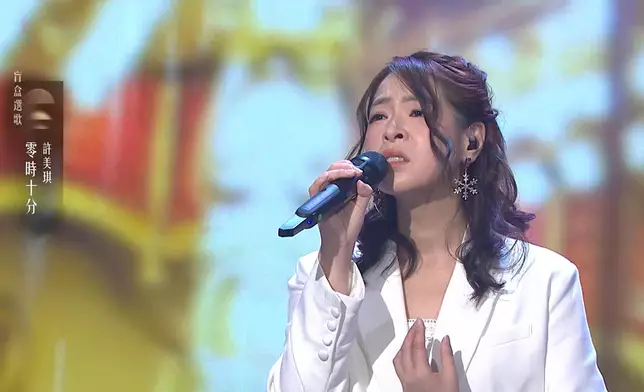 美琪的歌聲感動陳松伶。
