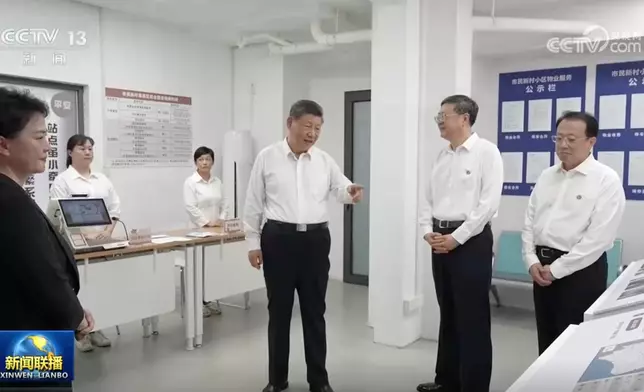 習近平到上海考察。央視截圖