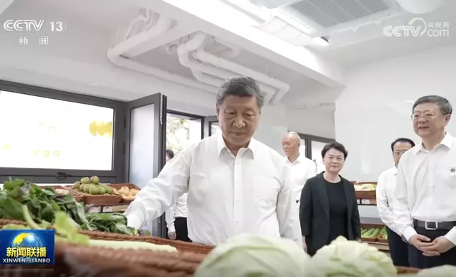 習近平到上海考察。央視截圖