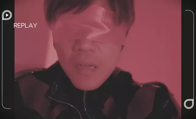 亦偉於MV中被蒙眼兼鎖上鐵鏈。