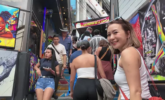 Christy喺麥德林街頭穿梭。
