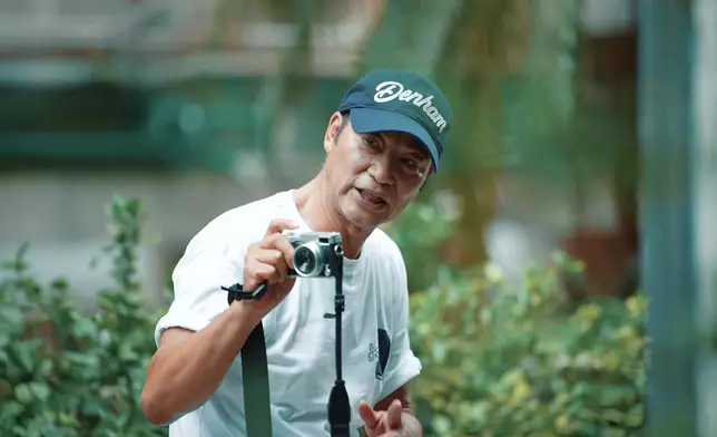 華哥化身攝影師，影得非常專業。