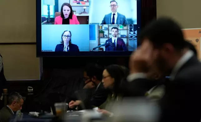 從左上起，OpenAI的摩根·德懷爾、Meta的沙恩·卡希爾、Google的愛麗絲·弗蘭德及Anthropic的洛根·格雷厄姆，透過視像會議在紐約市議會的人工智能安全聽證會上作證。攝於紐約，周一，2026年10月5日。(美聯社圖片/Seth Wenig) AP圖片