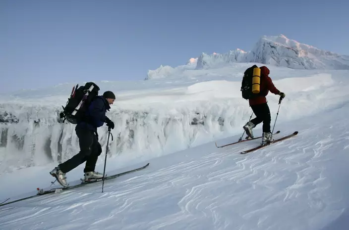 FILE - In this Dec. 17, 2006, file photo, rescuers start their ascent from 8500 feet to the summit of Mount Hood in search of three missing climbers near Government Camp, Ore., above Timberline Lodge. (AP Photo/Kevork Djansezian, File)