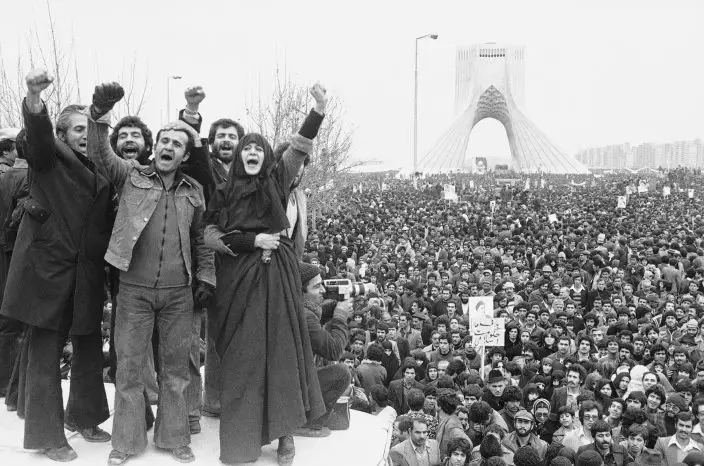 FILE - In this Jan. 19, 1979 file photo, more than a million supporters of an Islamic Republic assembled around the Shayad monument, in Tehran, Iran. Wednesday, Jan. 16, 2019 marks the 40th anniversary of the shah abandoning his Peacock Throne and leaving his nation for the last time in his life, setting the stage for the country's 1979 Islamic Revolution only a month later. (AP PhotoAristotle Saris, File)
