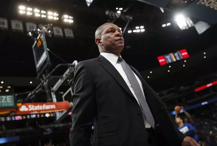 Los Angeles Clippers head coach Doc Rivers heads to the bench in the first half of an NBA basketball game against the Denver Nuggets, Sunday, Feb. 24, 2019, in Denver. (AP PhotoDavid Zalubowski)