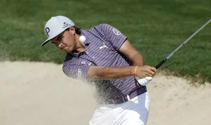 Rickie Fowler hits from a bunker on the 14th hole during the second round of the Valero Texas Open golf tournament Friday, April 5, 2019, in San Antonio. (AP PhotoEric Gay)