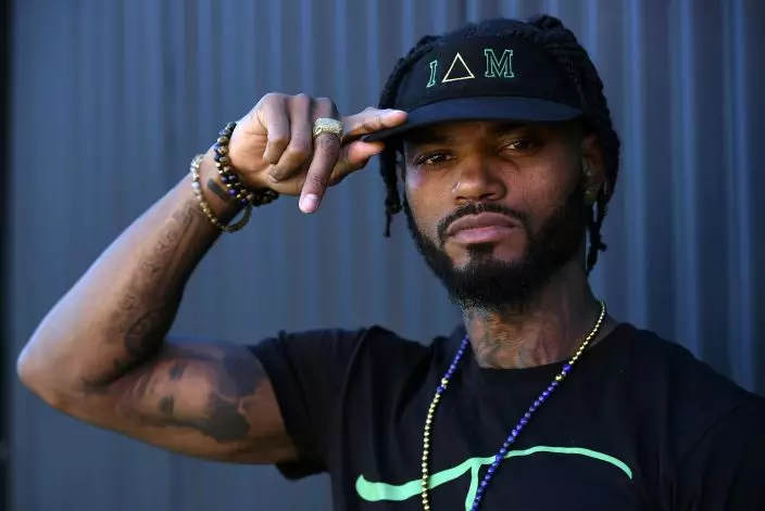 This Aug. 15, 2019 photo shows Danny "KP" Kilpatrick, a cast member in the reality television series "Black Ink Crew: Compton," at the IAM Compton tattoo shop in Compton, Calif. The show, which airs Wednesdays on VH1, follows the cast who attempt to create a “safe zone” in one of the tougher cities in California. The reality series is the third spinoff of the “Black Ink Crew” franchise. (Photo by Chris PizzelloInvisionAP)