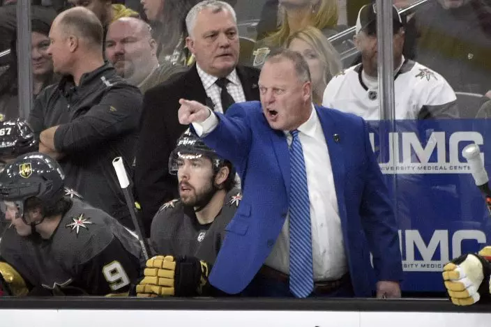 Vegas Golden Knights coach Gerard Gallant questions a call during the first period of the team's NHL hockey game against the Arizona Coyotes on Saturday, Dec. 28, 2019, in Las Vegas. (AP PhotoDavid Becker)