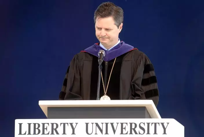 FILE - In this Saturday, May 19, 2007 file photo, Jerry Falwell Jr., new chancellor of Liberty University, speaks about his father, the Rev. Jerry Falwell, during his first graduation as the new chancellor of the university in Lynchburg, Va. On Tuesday, Aug. 25, 2020, Falwell Jr. said that he has submitted his resignation as head of evangelical Liberty University. (Jill NanceThe News & Advance via AP)
