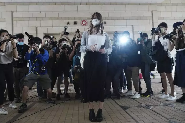 Hong Kong activist Agnes Chow arrives at a court in Hong Kong, Monday, Nov. 22. 2020. Hong Kong pro-democracy activists Joshua Wong, Agnes Chow and Ivan Lam appear at court for their trial, as the trio faces charges related to the besieging of a police station during anti-government protests last year. (AP PhotoVincent Yu)