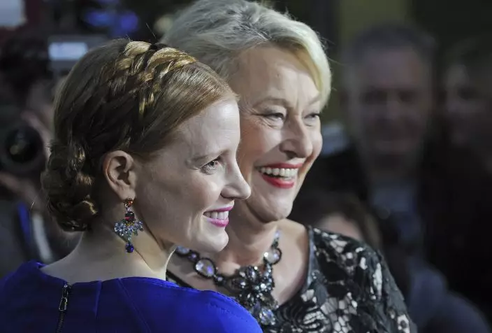 FILE - In this file photo dated Tuesday, March 7, 2017, Hollywood star Jessica Chastain, left, who plays the main character and Teresa Zabinska, the daughter of Jan and Antonina Zabinski pose prior to the gala screening of "The Zookeeper's Wife", in Warsaw, Poland. Teresa Zabinska-Zawadzki, the daughter of former Warsaw ZOO directors Jan and Antonina Zabinski, who saved hundreds of Jews from the Holocaust by hiding them at the zoo, and whose story was told in the 2017 Hollywood movie “The Zookeeper’s Wife,” died Saturday aged 77, the zoo said on its Facebook page Sunday March 31, 2021.(AP PhotoAlik Keplicz, FILE)