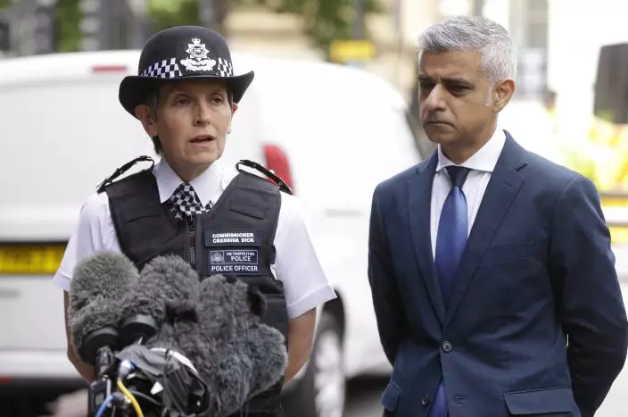 FILE - London Police Commissioner Cressida Dick, left, and the Mayor of London Sadiq Khan take part in a media conference at London Bridge in London, June 5, 2017. The head of London's Metropolitan Police, Cressida Dick, said she is resigning Thursday Feb. 10, 2022, after a string of controversies that undermined public confidence in the force and prompted a falling out between her and the capital's mayor, Sadiq Khan. (AP PhotoAlastair Grant, File)