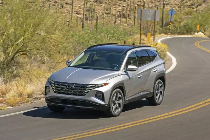 This photo provided by Hyundai shows the 2022 Hyundai Tucson, a compact SUV that gets about 38 mpg in mixed driving. (Courtesy of Hyundai Motor America via AP)