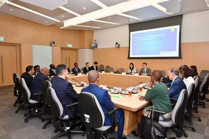 A delegation of 13 overseas government officials completed its visit to Hong Kong today (May 29). Photo shows the delegation meeting with the Under Secretary for Education, Dr Sze Chun-fai (first right), to learn about the unique advantages of Hong Kong's post-secondary education. Source: HKSAR Government Press Releases