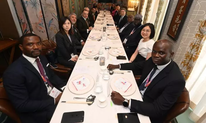A delegation of 13 overseas government officials completed its visit to Hong Kong today (May 29). Photo shows the Acting Chief Secretary for Administration, Mr Cheuk Wing-hing (fifth right), with the delegation. Source: HKSAR Government Press Releases