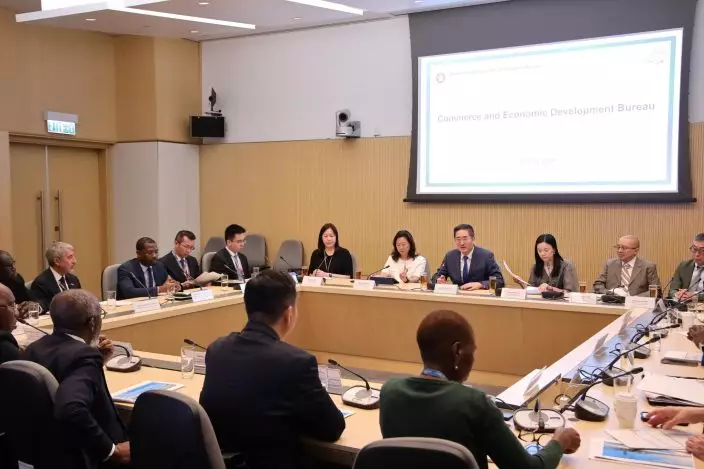 A delegation of 13 overseas government officials completed its visit to Hong Kong today (May 29). Photo shows the delegation meeting with the Under Secretary for Commerce and Economic Development, Dr Bernard Chan (fourth right), to exchange views on strengthening communication and co-operation. Source: HKSAR Government Press Releases