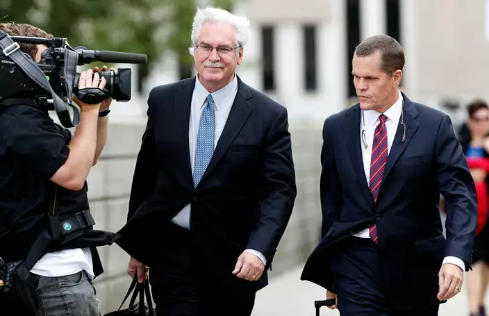 Pop singer Taylor Swift's lawyers Jesse P. Schaudies, Jr., left, and Douglas Baldridge leave the federal courthouse after the fourth day in a civil trial. (AP Photo/David Zalubowski)