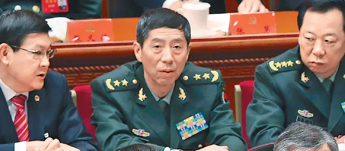 國防部長李尚福（中）為史上首位被美國制裁的解放軍上將。